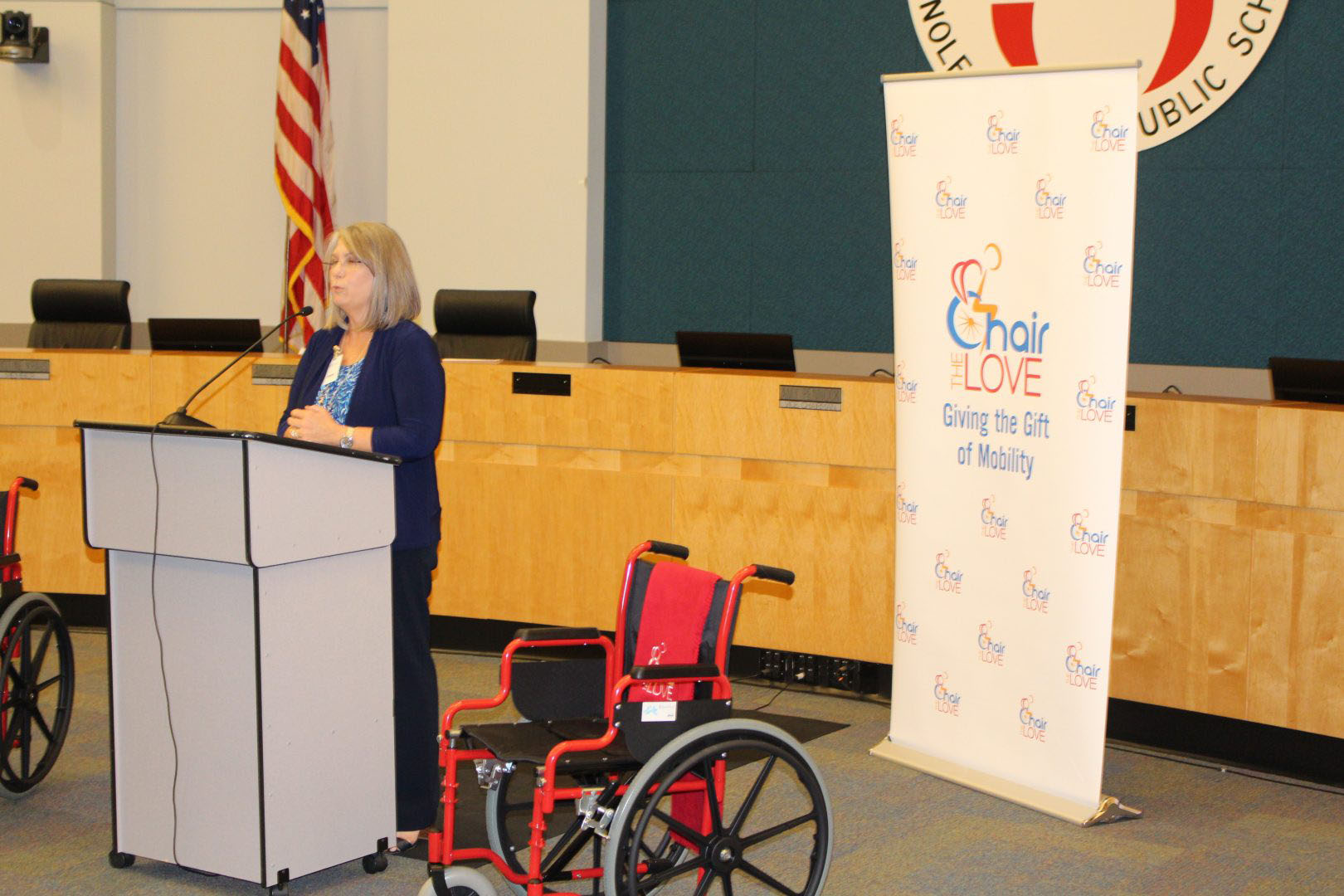 announcement about gifted wheelchairs at a school