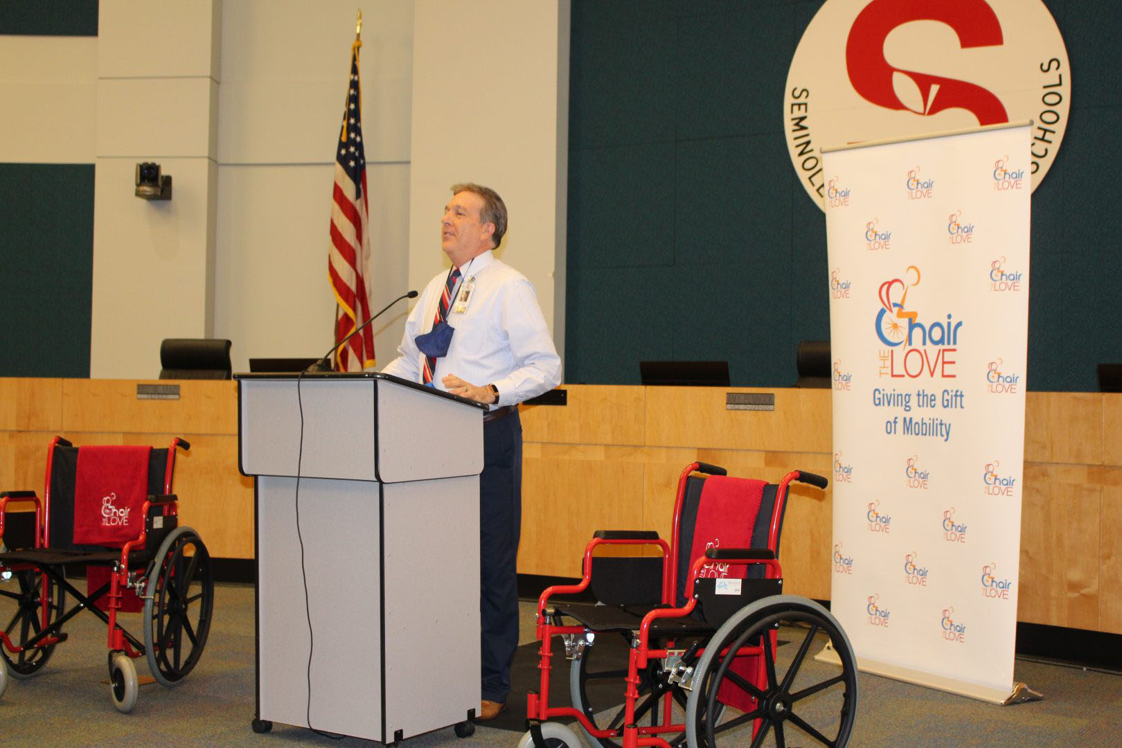 announcement about gifted wheelchairs at a school